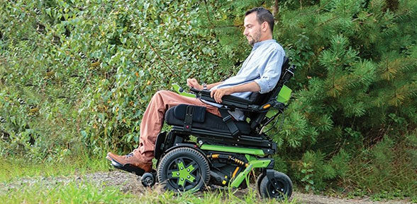 Man driving an electric wheelchair
