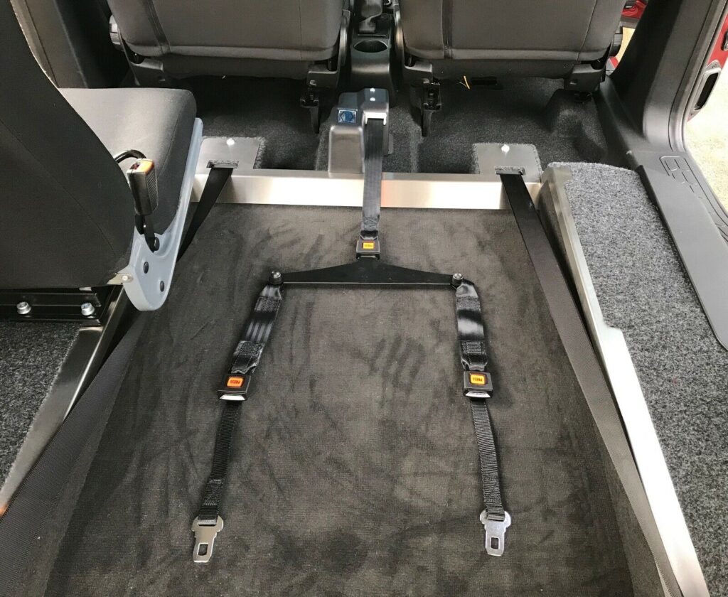 Atom Powered Winch Assists (Un)Loading Wheelchair Passengers Able